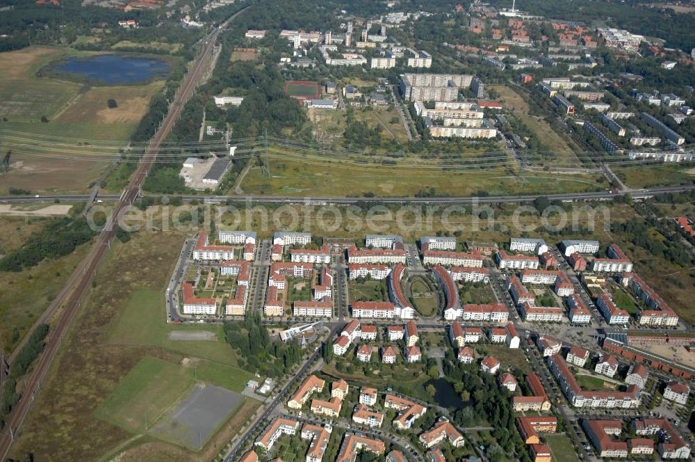 Aerial photograph Berlin - Blick über das Neubaugebiet Karow-Nord über die Autobahn A10 / E65 in Richtung Wohngebiet Buch-Süd.
