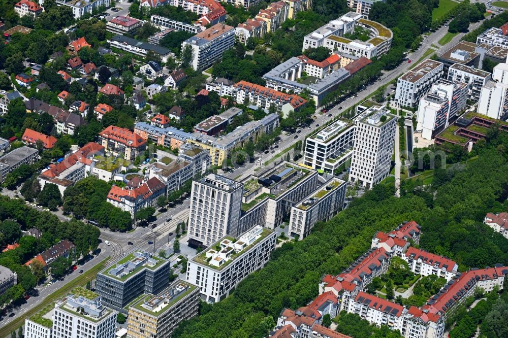 München from the bird's eye view: The city center in the downtown area overlooking the road course of the Leopoldstrasse with office buildings and high-rise buildings in Munich in the state Bavaria, Germany