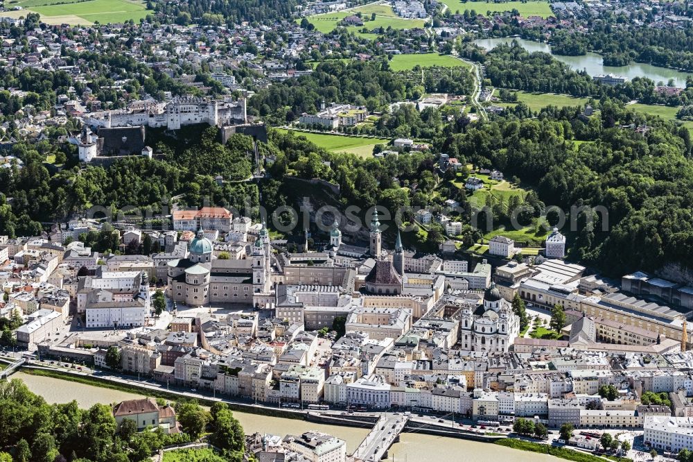 Salzburg from the bird's eye view: City center in the downtown area on the banks of river course of Salzach in Salzburg in Austria
