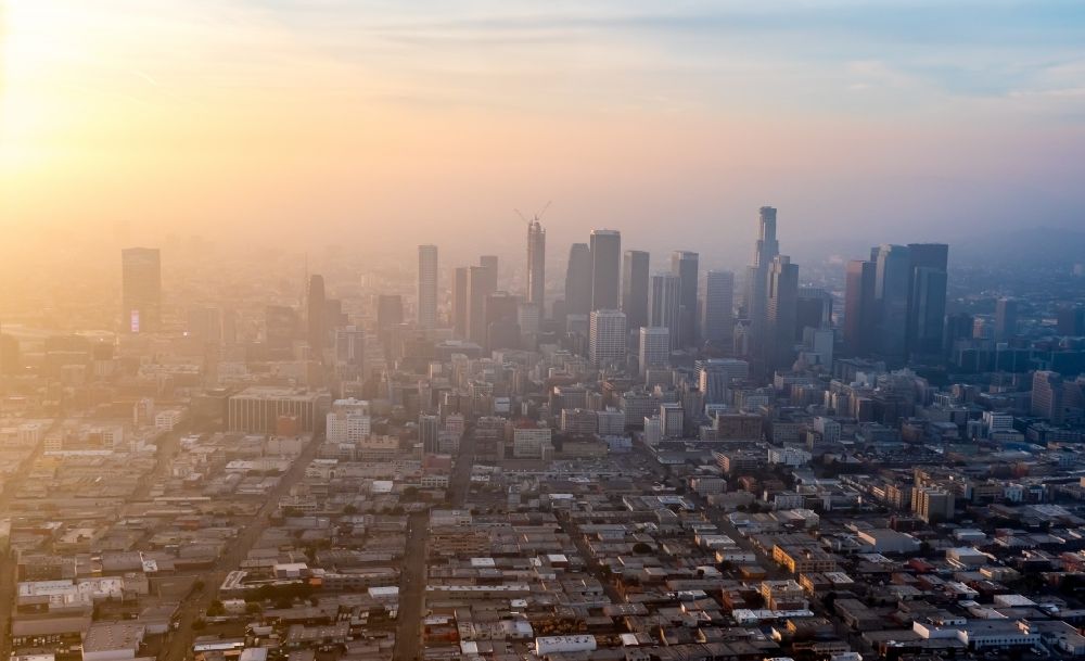 Los Angeles from the bird's eye view: City center with the skyline of towers and highrises in smog in Los Angeles in California, USA
