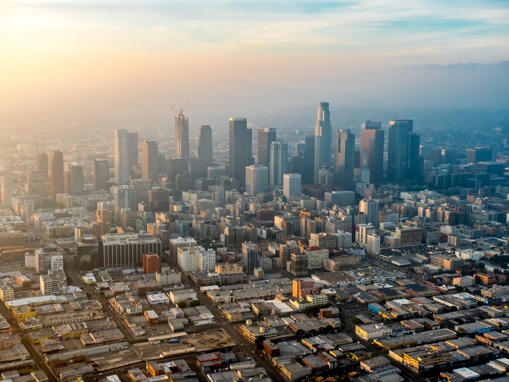 Aerial image Los Angeles - City center with the skyline of towers and highrises in smog in Los Angeles in California, USA