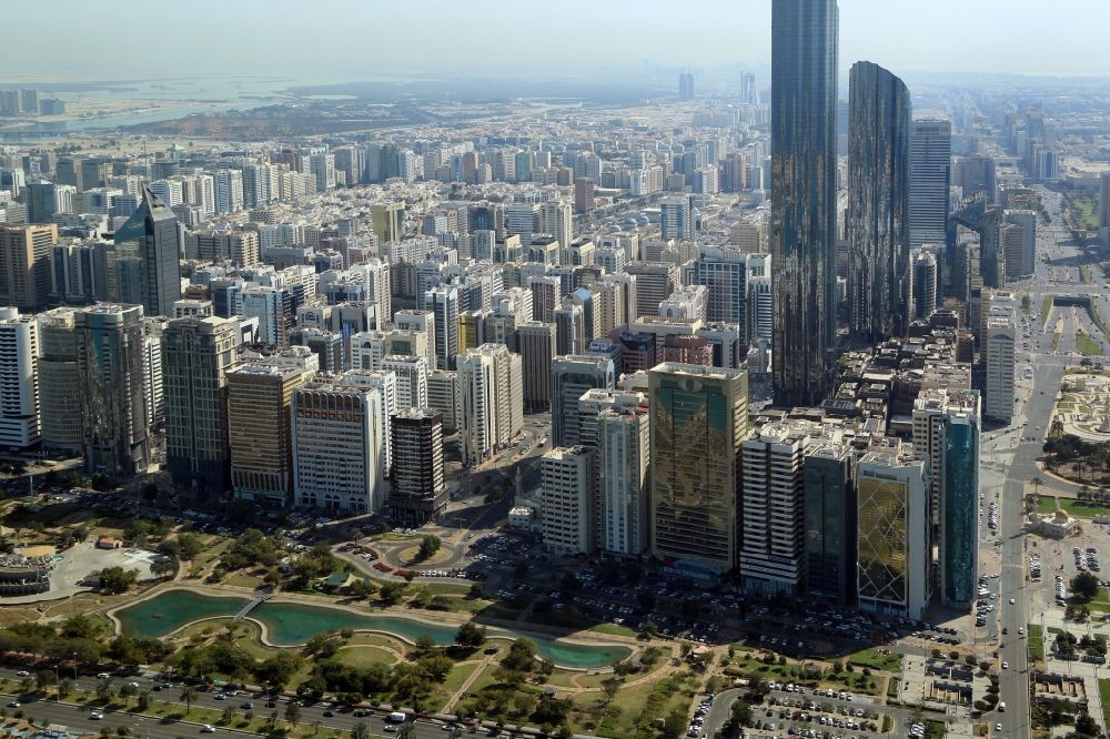 Abu Dhabi from the bird's eye view: City center with the skyline in the downtown area at the World Trade Center with Burj Mohammed Bin Rashid in Abu Dhabi in United Arab Emirates