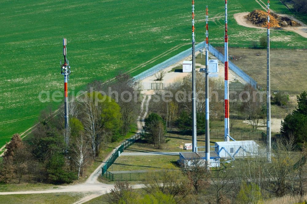 Schönefeld from above - Steel mast funkturm and transmission system as basic network transmitter for air traffic systems in the district Waltersdorf in Schoenefeld in the state Brandenburg, Germany