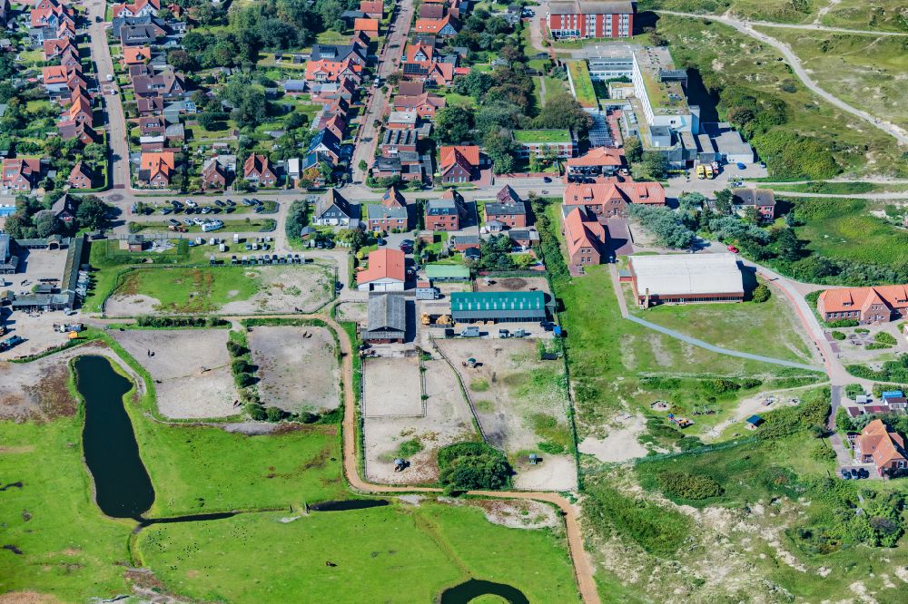 Norderney from the bird's eye view: Stables and paddocks of the Junkmann riding school on the island of Norderney in the state of Lower Saxony, Germany
