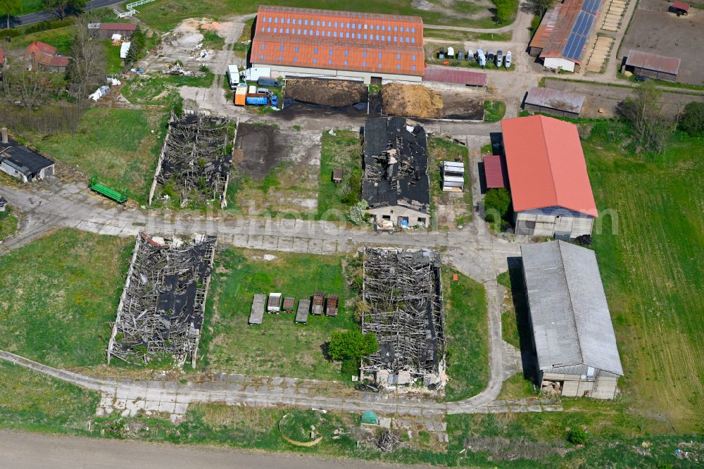 Hohenbruch from above - Ruins of abandoned and derelict animal breeding stables and agricultural outbuildings on street Hohenbrucher Dorfstrasse in Hohenbruch in the state Brandenburg, Germany