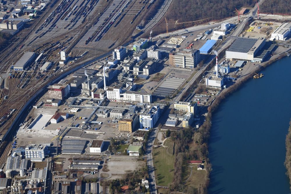 Aerial photograph Muttenz - Buildings and production halls on the premises of the industrial park Infrapark Baselland AG in Muttenz in the canton Basel-Landschaft, Switzerland