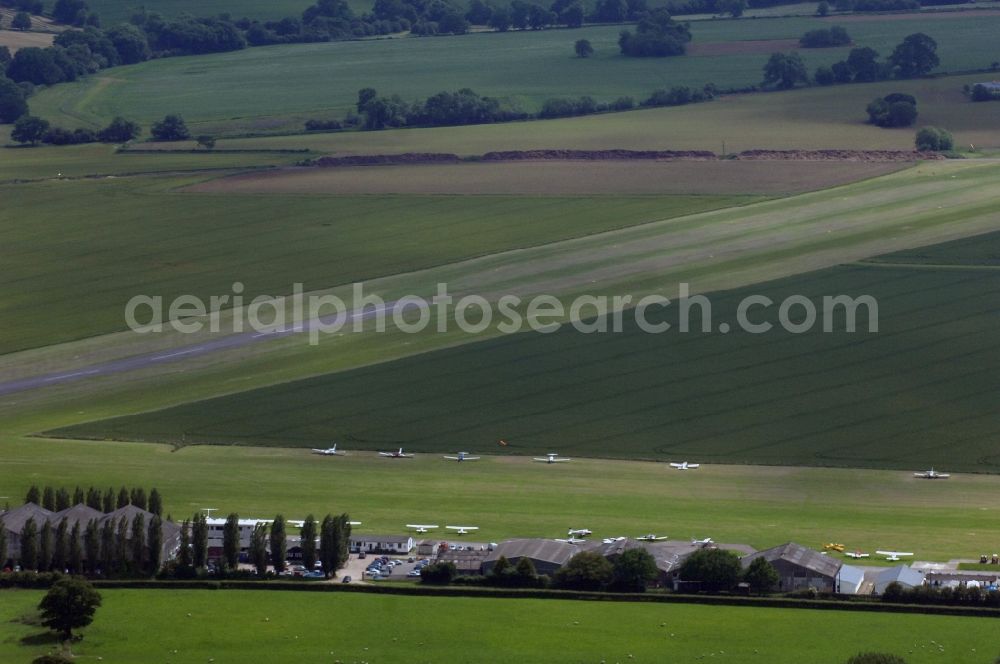 Abridge from above - View at the airstrip and several small planes parked on the Stapleford Airfield in Abridge in Essex in the UK. The airfield is located inthe vicinity of London