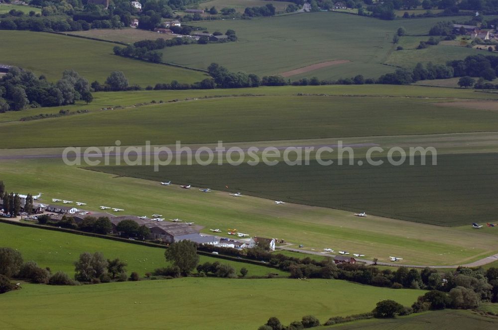 Aerial photograph Abridge - View at the airstrip and several small planes parked on the Stapleford Airfield in Abridge in Essex in the UK. The airfield is located inthe vicinity of London