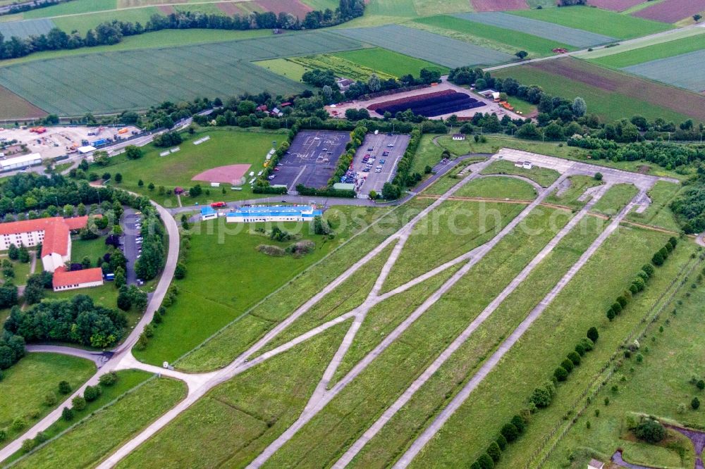 Geldersheim from the bird's eye view: Locked runway at the former airfield in Geldersheim in the state Bavaria, Germany