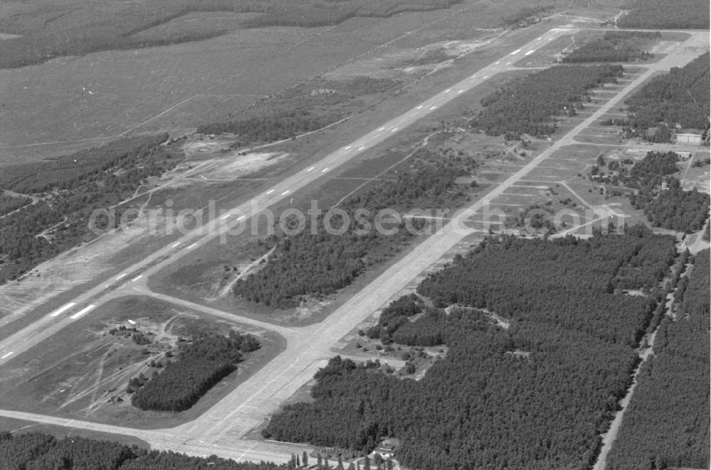 Sperenberg from above - Locked runway at the former airfield of GSSD of ehemaligen DDR in Sperenberg in the state Brandenburg, Germany