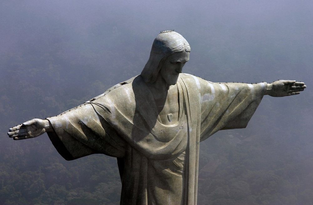 Aerial image Rio de Janeiro - Statue of Christ the Redeemer on Corcovado Mountain in the Tijuca forest in Rio de Janeiro in Brazil