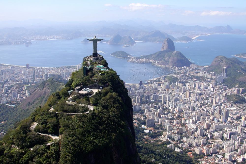 Rio de Janeiro from the bird's eye view: Statue of Christ the Redeemer on Corcovado Mountain in the Tijuca forest in Rio de Janeiro in Brazil