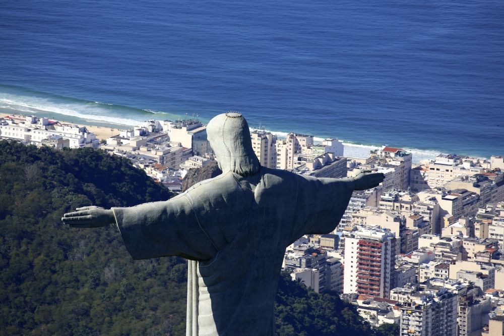 Rio de Janeiro from the bird's eye view: Statue of Christ the Redeemer on Corcovado Mountain in the Tijuca forest in Rio de Janeiro in Brazil