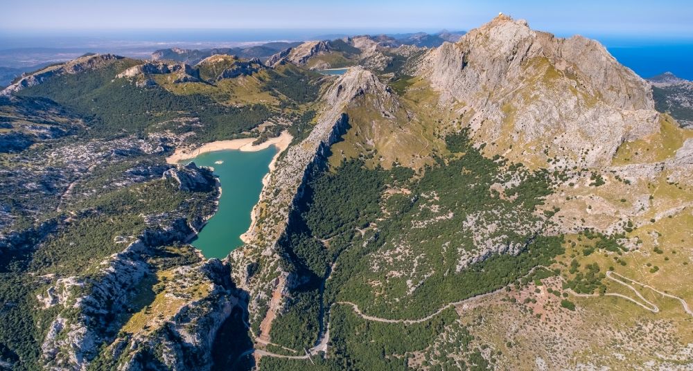 Aerial image Fornalutx - Impoundment and shore areas at the lake CA?ber - Embassament de CA?ber in the mountains next to the Puig Major mountain in Fornalutx in Balearic islands, Spain