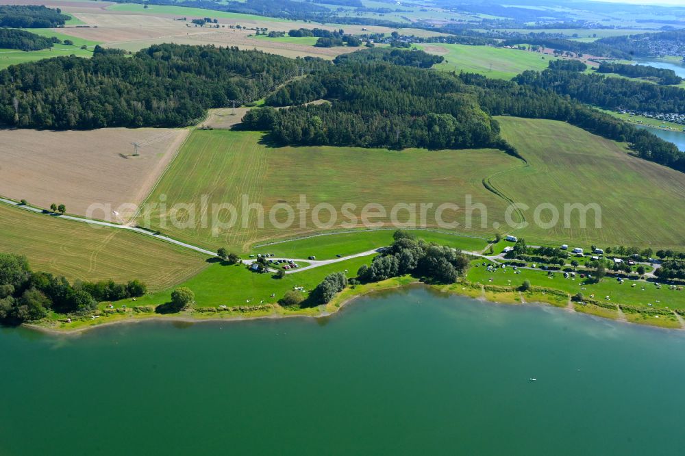 Pöhl from the bird's eye view: Reservoir and nudist beach on the banks of the Bellwitzbach reservoir of the dam on Poehler Strasse in Poehl in the state Saxony, Germany