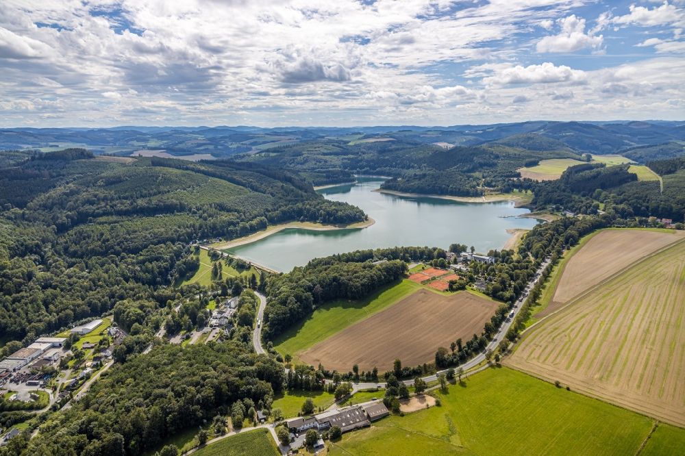 Aerial image Meschede - Shore areas and dam at the reservoir Hennesee in Meschede in the state North Rhine-Westphalia, Germany