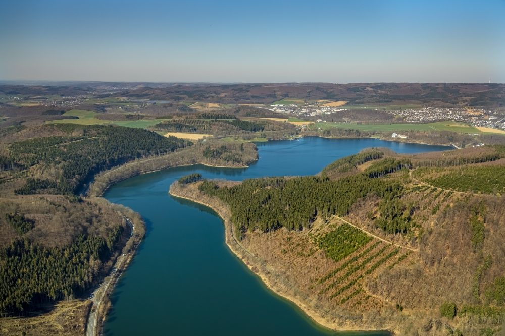 Meschede from above - Shore areas and dam at the reservoir Hennesee in Meschede at Sauerland in the state North Rhine-Westphalia, Germany
