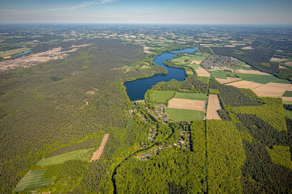 Hullern from above - Riverside areas at the Hullern reservoir with a view of fields, forests and the municipality of Hullern in the state of North Rhine-Westphalia, Germany