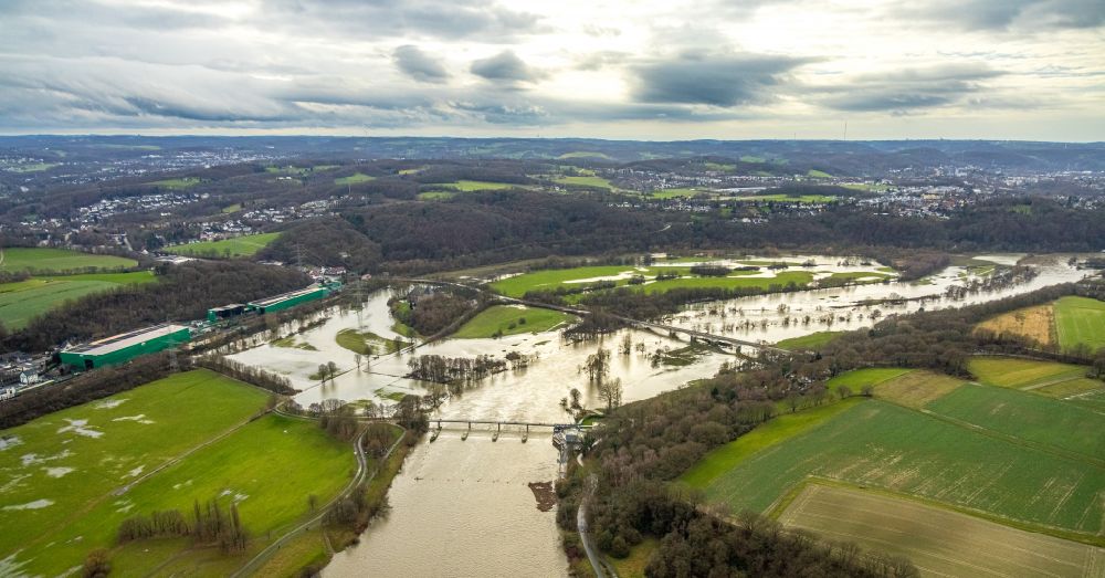 Aerial image Bochum - Weir on the banks of the flux flow Ruhr during the flood disaster with brown water masses in Bochum at Ruhrgebiet in the state North Rhine-Westphalia, Germany