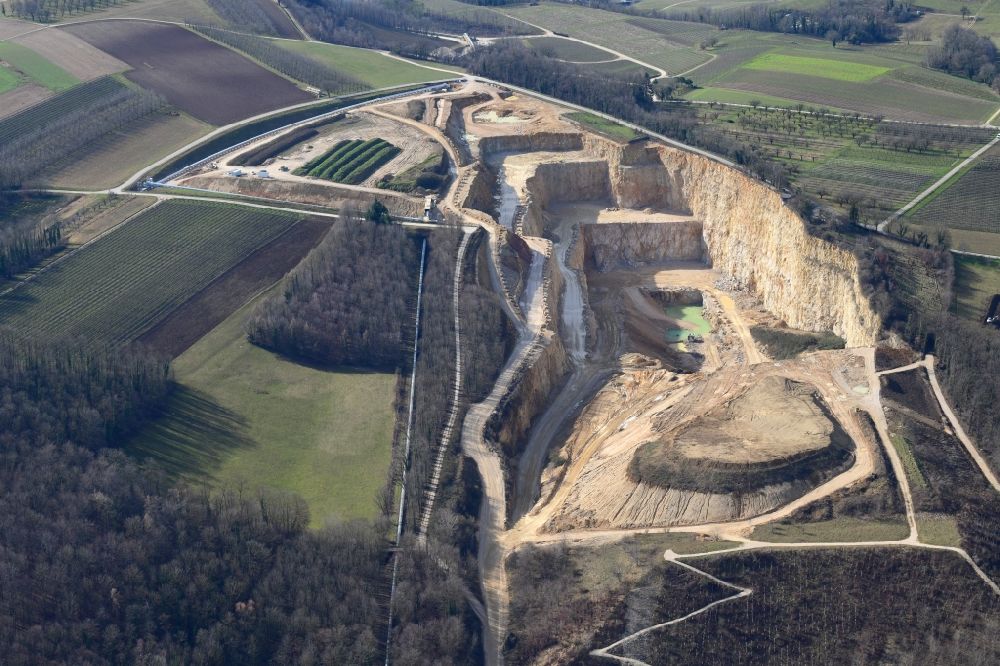 Efringen-Kirchen from the bird's eye view: Company grounds and stone quarry for limestone of the Lhoist-Group ( former HeidelbergerCement ) in the district Istein in Efringen-Kirchen in the state Baden-Wurttemberg, Germany