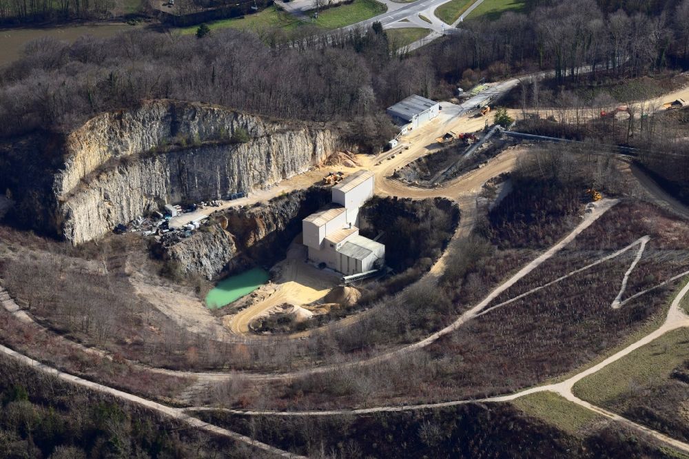 Efringen-Kirchen from above - Company grounds and stone quarry for limestone of the Lhoist-Group ( former HeidelbergerCement ) in the district Istein in Efringen-Kirchen in the state Baden-Wurttemberg, Germany
