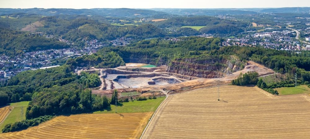 Hagen from the bird's eye view: Quarry for the mining of Hohenlimburger Kalkwerke GmbH in the district Hohenlimburg in Hagen in the state North Rhine-Westphalia, Germany