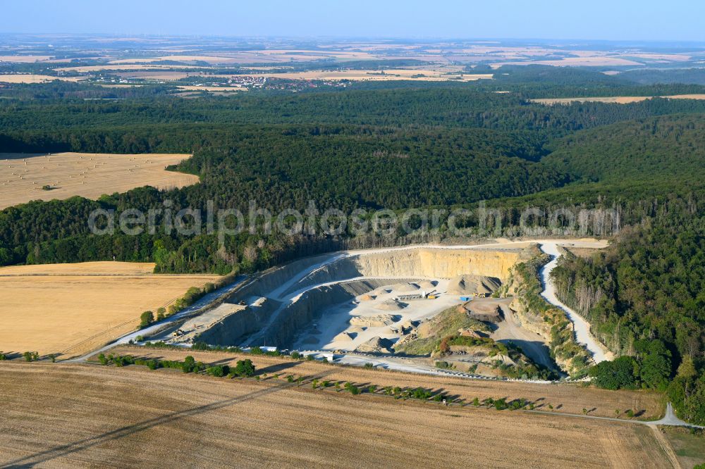 Gutendorf from the bird's eye view: Quarry for the mining and handling of MKW Mitteldeutsche Hartstein- Kies- and Mischwerke GmbH in Gutendorf in the state Thuringia, Germany