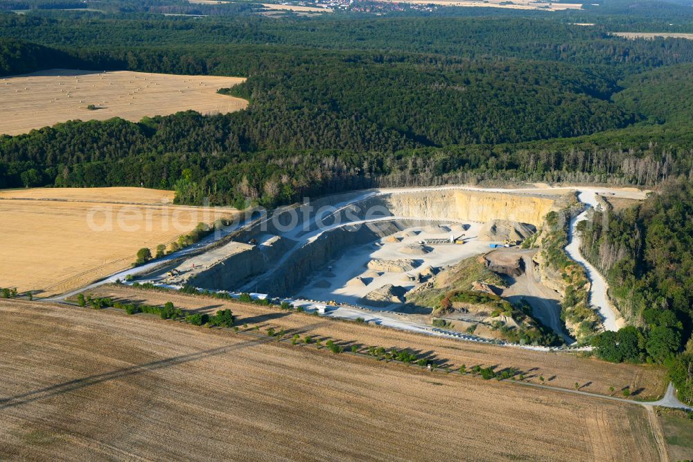Aerial image Gutendorf - Quarry for the mining and handling of MKW Mitteldeutsche Hartstein- Kies- and Mischwerke GmbH in Gutendorf in the state Thuringia, Germany