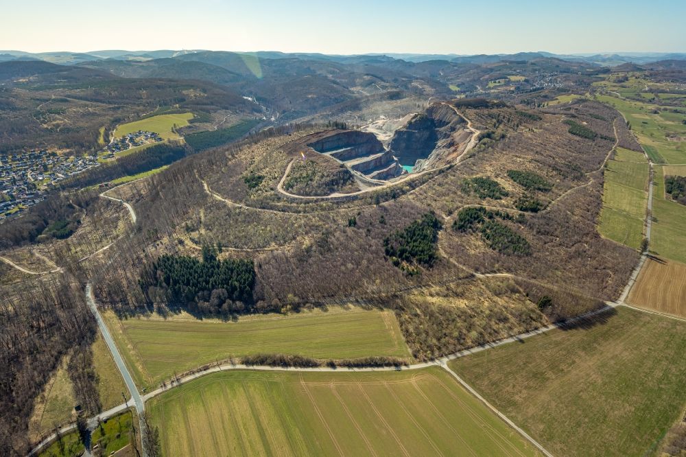 Brilon from above - Quarry for the mining and handling of Grauwacke of Westdeutschen Grauwacke Union GmbH in Brilon at Sauerland in the state North Rhine-Westphalia, Germany