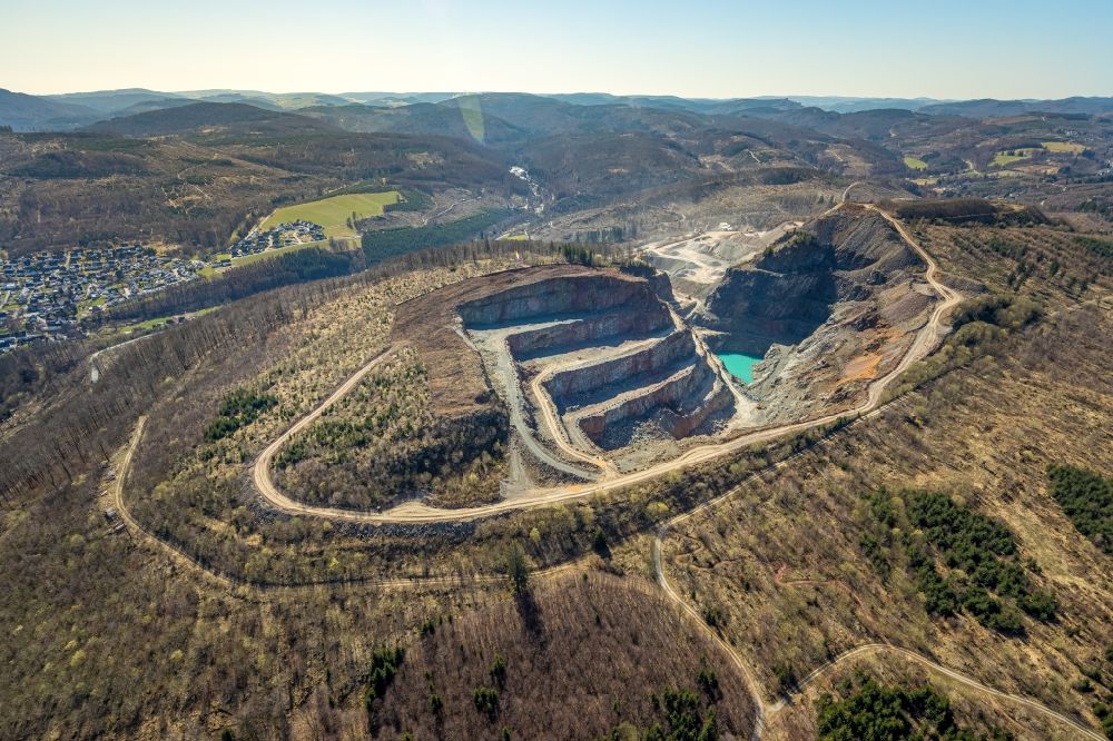 Brilon from the bird's eye view: Quarry for the mining and handling of Grauwacke of Westdeutschen Grauwacke Union GmbH in Brilon at Sauerland in the state North Rhine-Westphalia, Germany