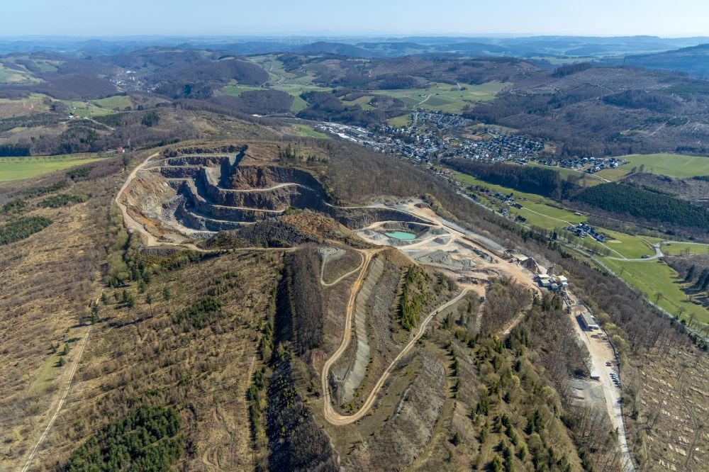 Brilon from above - Quarry for the mining and handling of Grauwacke of Westdeutschen Grauwacke Union GmbH in Brilon at Sauerland in the state North Rhine-Westphalia, Germany
