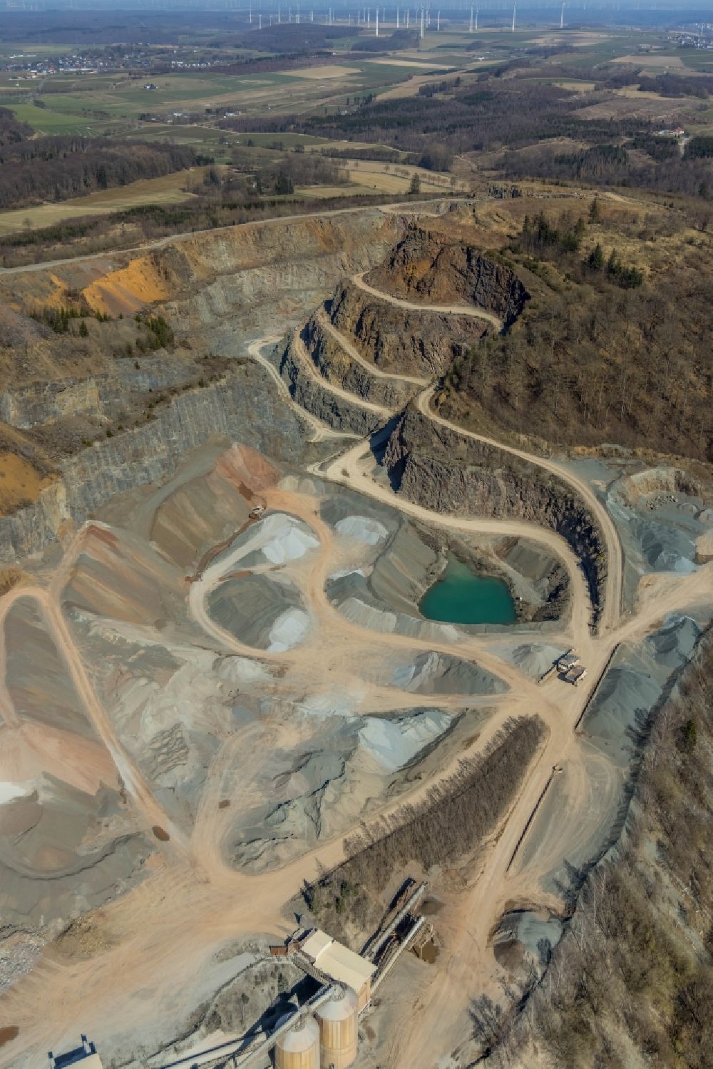 Brilon from the bird's eye view: Quarry for the mining and handling of Grauwacke of Westdeutschen Grauwacke Union GmbH in Brilon in the state North Rhine-Westphalia, Germany