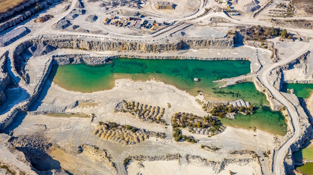 Aerial image Erwitte - Quarry for the mining and handling of limestone of Steinwerke F. J. Risse GmbH & Co. KG in Erwitte in the state North Rhine-Westphalia, Germany