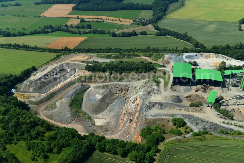 Aerial photograph Sundern (Sauerland) - Quarry for the mining and handling of limestone in the district Hellefeld in Sundern (Sauerland) in the state North Rhine-Westphalia, Germany