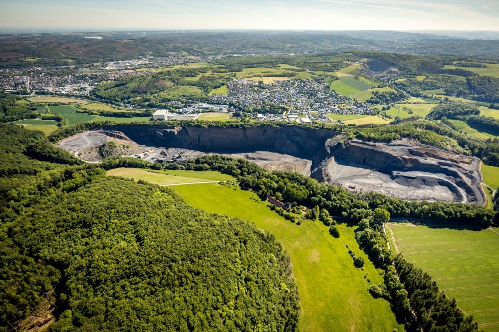 Arnsberg from above - Quarry for the mining and handling of limestone in the district Mueschede in Arnsberg in the state North Rhine-Westphalia, Germany