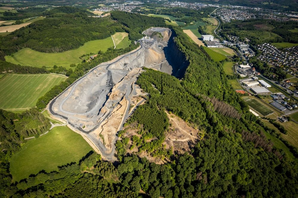 Aerial image Arnsberg - Quarry for the mining and handling of limestone in the district Mueschede in Arnsberg in the state North Rhine-Westphalia, Germany
