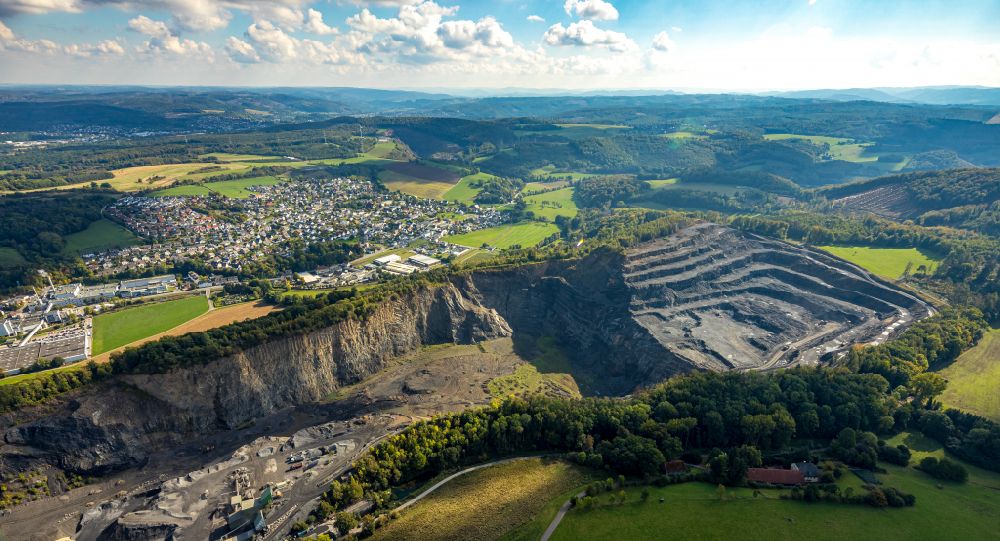 Aerial image Arnsberg - Quarry for the mining and handling of limestone in the district Mueschede in Arnsberg in the state North Rhine-Westphalia, Germany