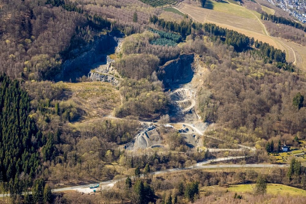 Ramsbeck from the bird's eye view: Quarry for the mining and handling of gravel and sand in Ramsbeck at Sauerland in the state North Rhine-Westphalia, Germany