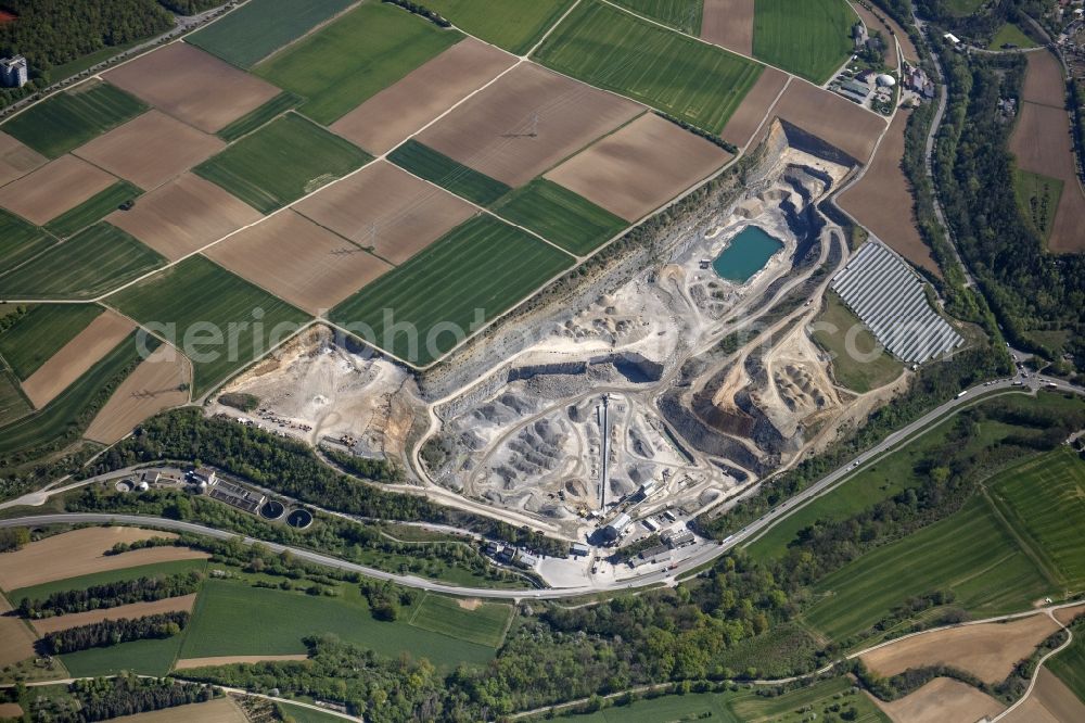 Aerial photograph Illingen - Quarry for the mining and handling of Sondstone ond gravel in Illingen in the state Baden-Wuerttemberg, Germany