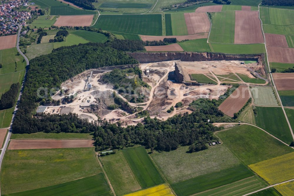 Aerial photograph Karlstadt - Quarry for the mining and handling of gravel of the Emil Vaeth GmbH Schotterwerk and Bauschuttrecycling Am Schotterwerk in Karlstadt in the state Bavaria, Germany
