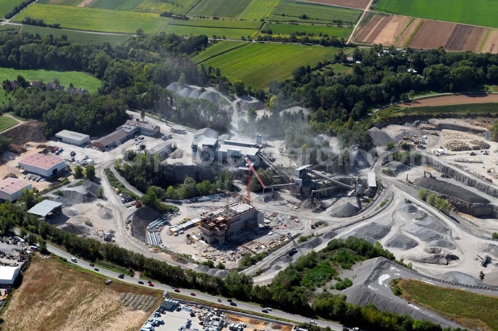 Aerial image Talheim - Quarry for the mining and handling of gravel and sledges overlooking the construction site to build a new gravel plant in Talheim in the state Baden-Wurttemberg, Germany