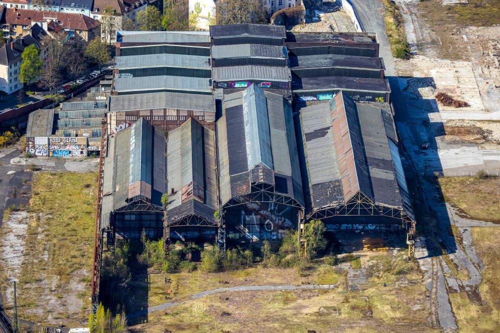 Dortmund from above - Disused production halls and technical equipment of the HSP Hoesch sheet piling and Profile GmbH in Dortmund in North Rhine-Westphalia. The HSP GmbH was a steel construction companies and manufacturers of steel sheet piles and profiles