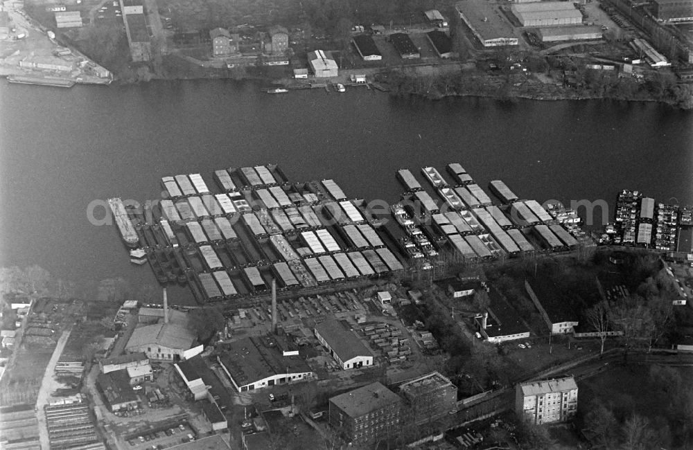 Berlin from above - Decommissioned packages of the ships and towing units of the former GDR inland shipping on the Rummelsburger See in the Rummelsburg district in Berlin, Germany