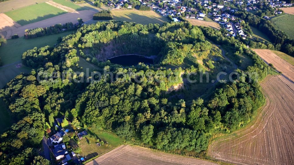 Aerial image Eulenberg - Unused renatured quarry ond old volconic cone in Eulenberg in the state North Rhine-Westphalia, Germany