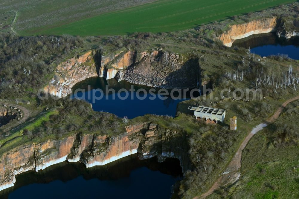 Aerial photograph Wettin-Löbejün - Unused renatured quarry with quarry pond at the Loebejuen quarry in the district Domnitz in Wettin-Loebejuen in the state Saxony-Anhalt, Germany