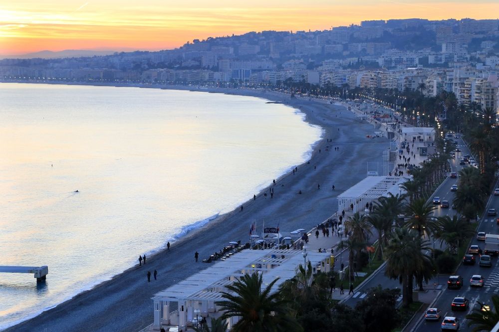 Nizza from above - Beach of the Mediterranean Sea and coastal area of Promenade des Anglais in Nice in Provence-Alpes-Cote d'Azur, France