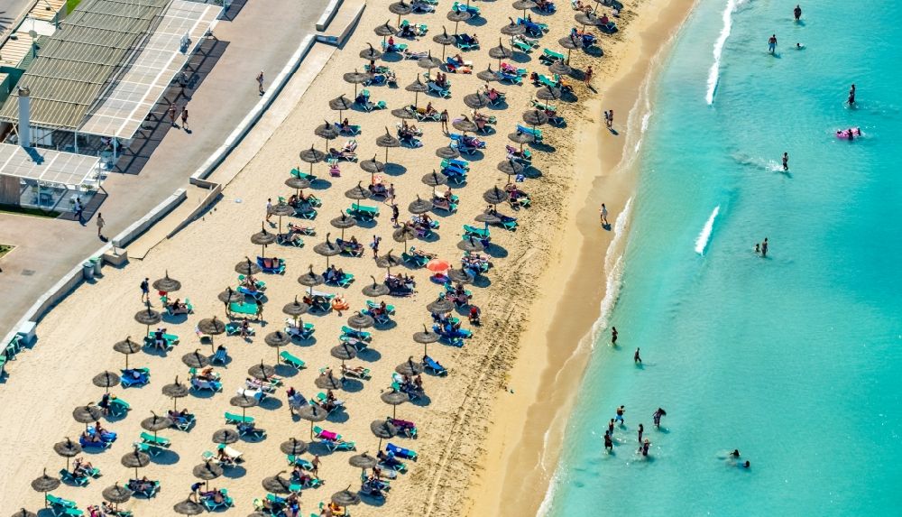 Palma from above - Beach chair on the sandy beach ranks in the coastal area of Ballermann 8 on Carretera de l'Arenal in Palma in Balearic island of Mallorca, Spain
