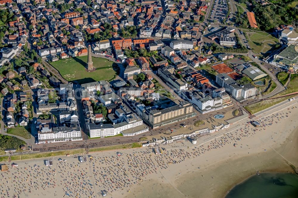 Borkum from above - Beach chair on the sandy beach ranks in the coastal area of the North Sea at the edge of the residential area of Borkum in the state Lower Saxony
