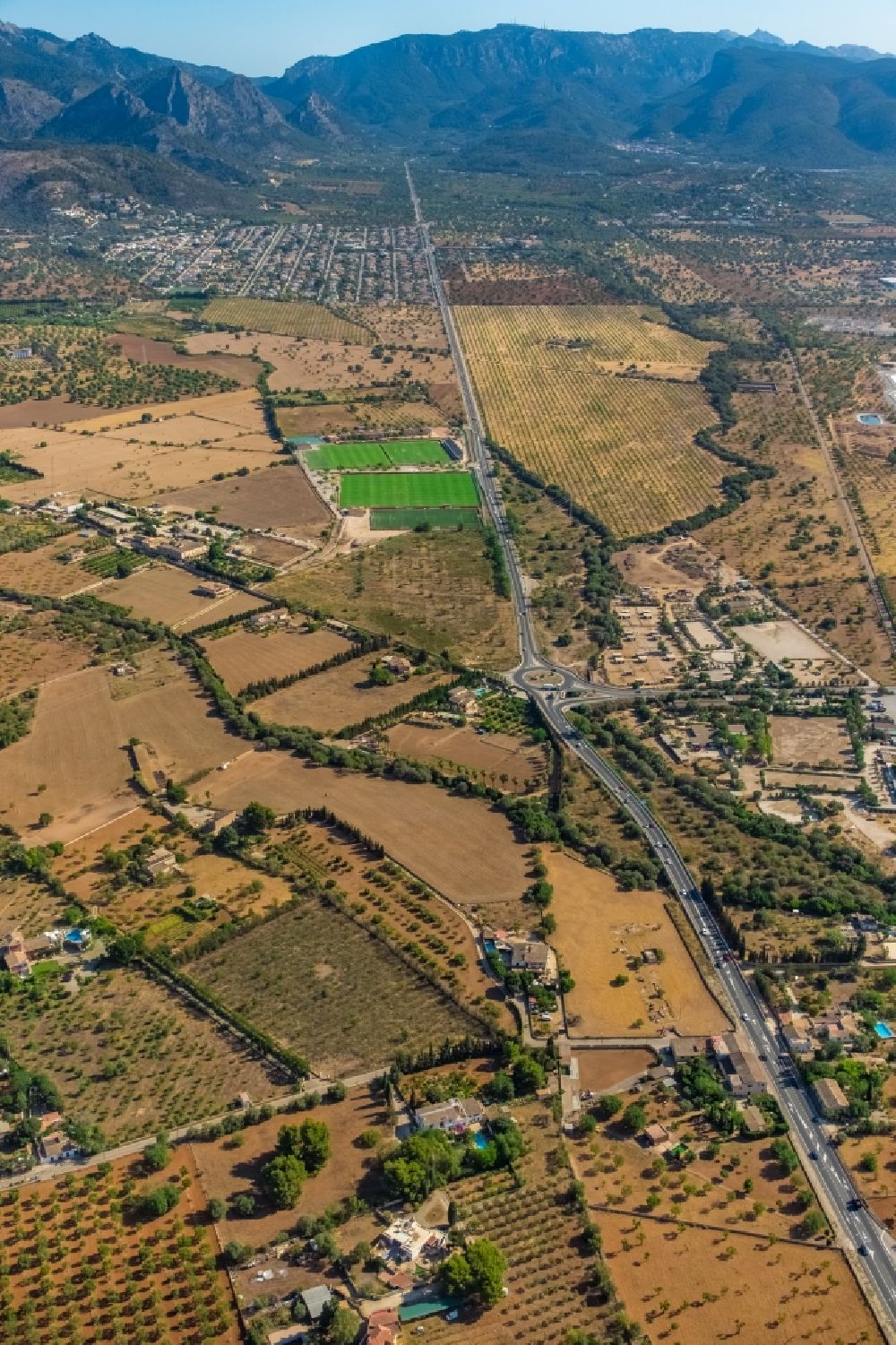 Aerial image Palma - Street - road guidance of the Ma-11 overlooking the local sports field complex in Palma in Balearic island of Mallorca, Spain