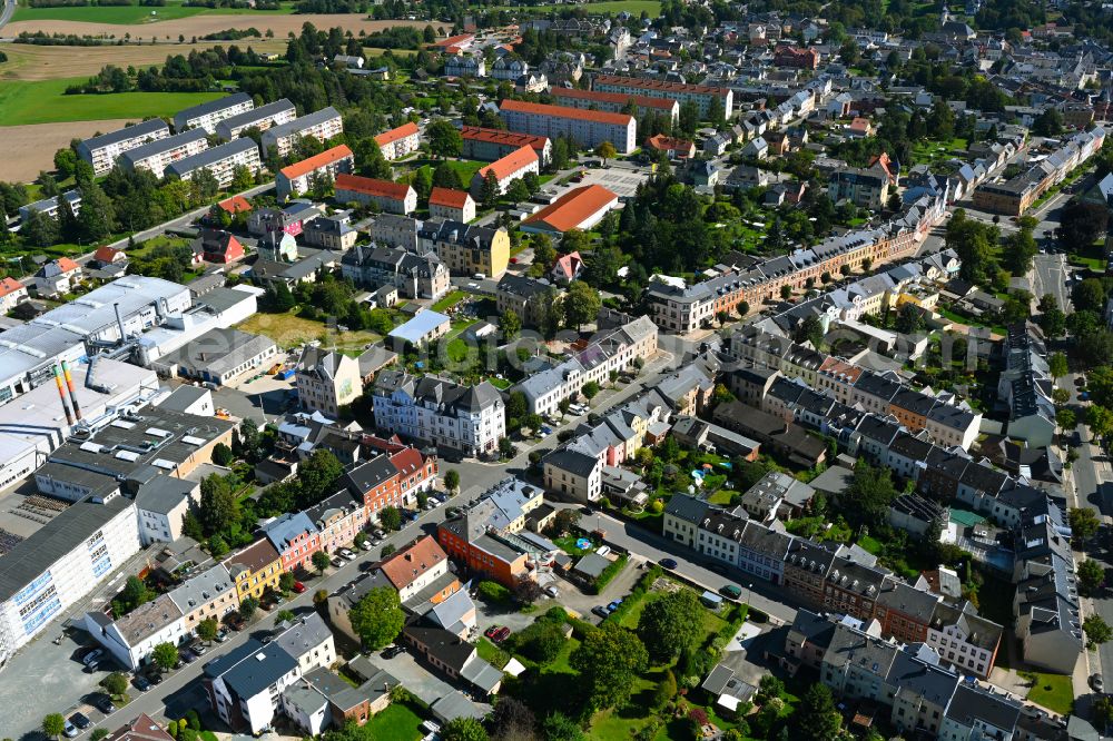 Treuen from the bird's eye view: Street guide of famous promenade and shopping street Bahnhofstrasse in Treuen in the state Saxony, Germany